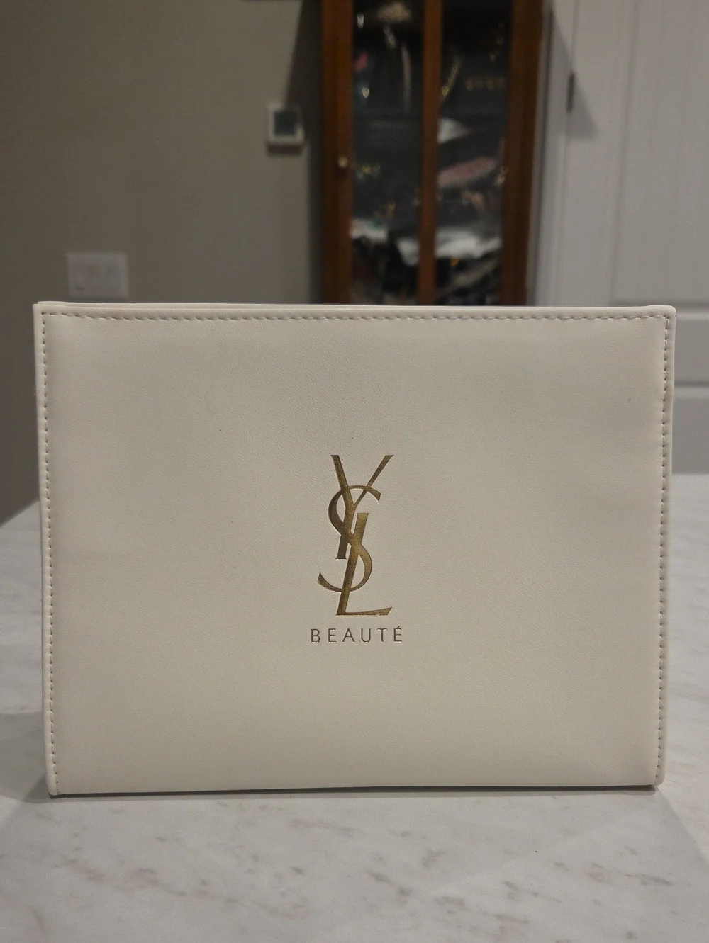 Yves Saint Laurent White Cosmetic Pouch with Gold Logo